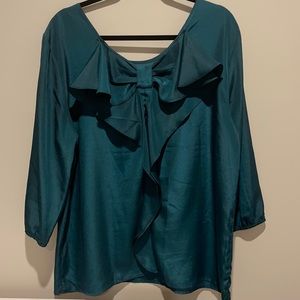 Green top with back bow detail